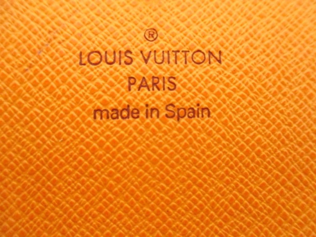 Louis Vuitton Mandarin Epi Porte Tresor International Trifold Wallet