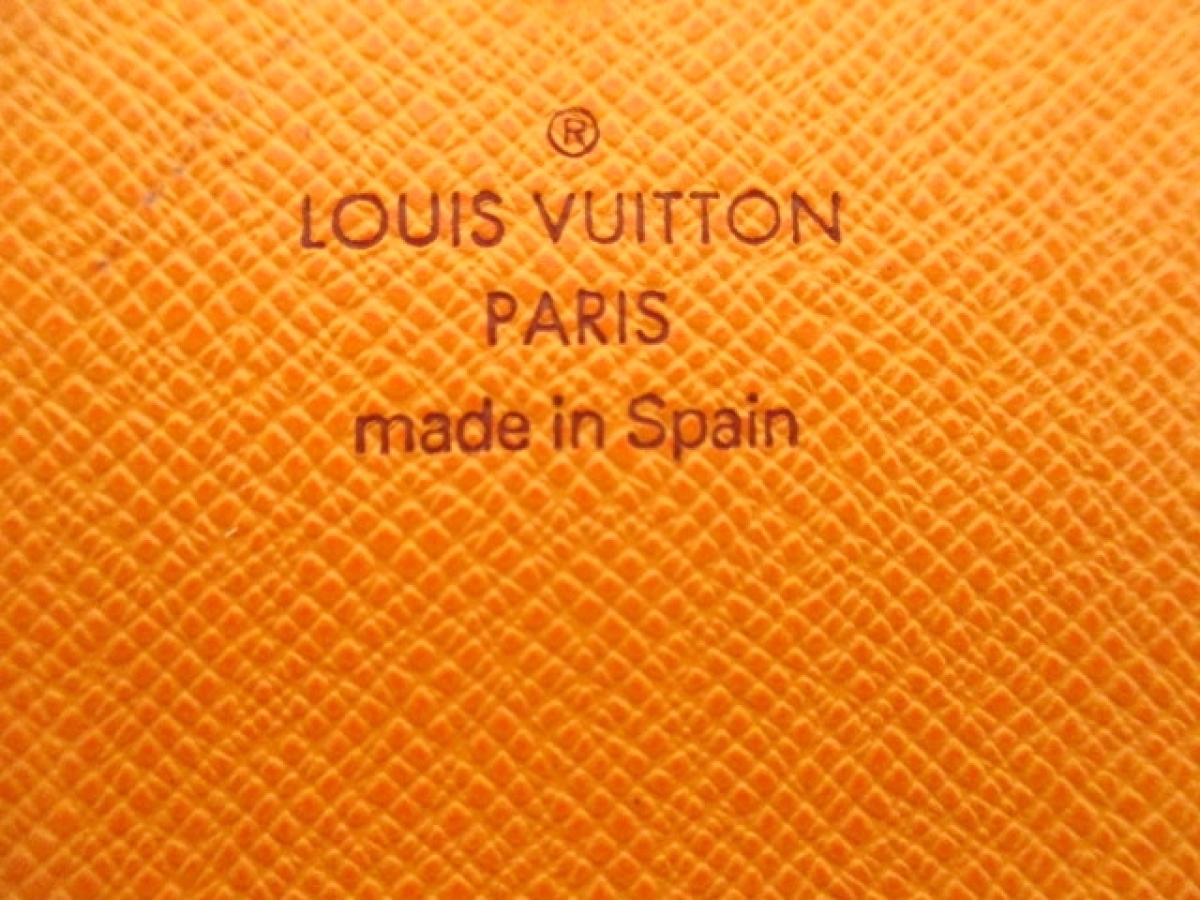 Louis Vuitton Mandarin Epi Porte Tresor International Trifold Wallet