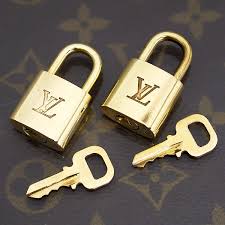 Authentic Louis Vuitton Gold Lock & Key Set – Haus of Luxury