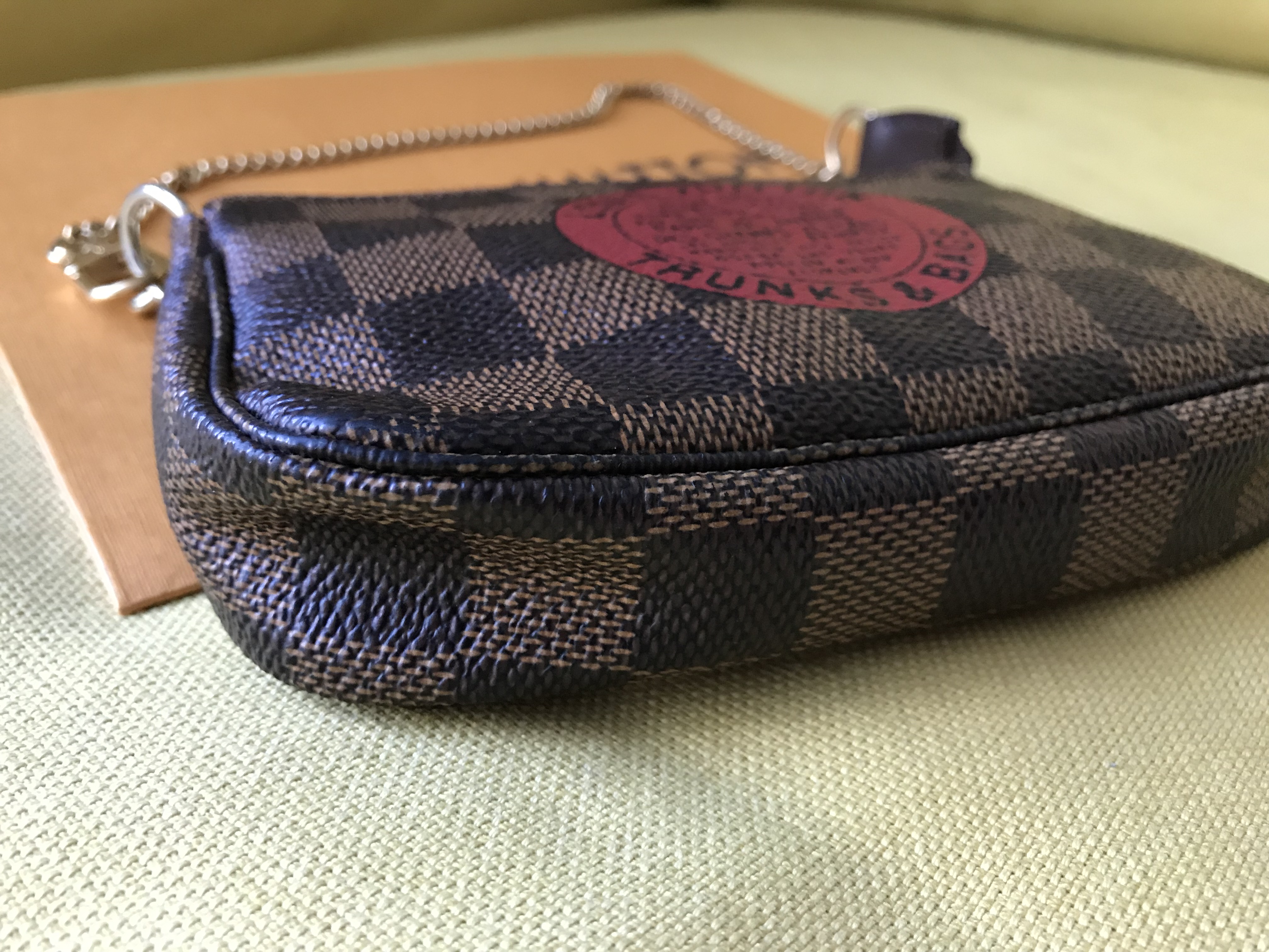 The Many Uses of a Mini Pochette Accessoire – Handbags & Zig Zags