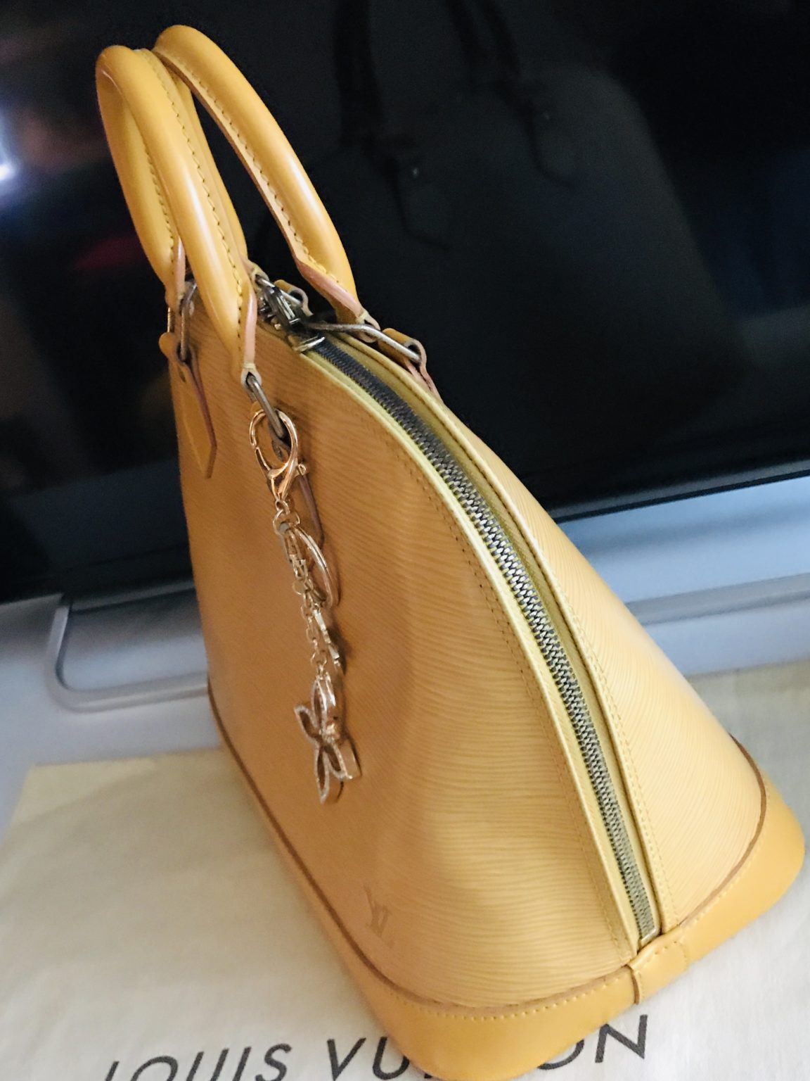 Yellow Epi Leather Alma Handbag