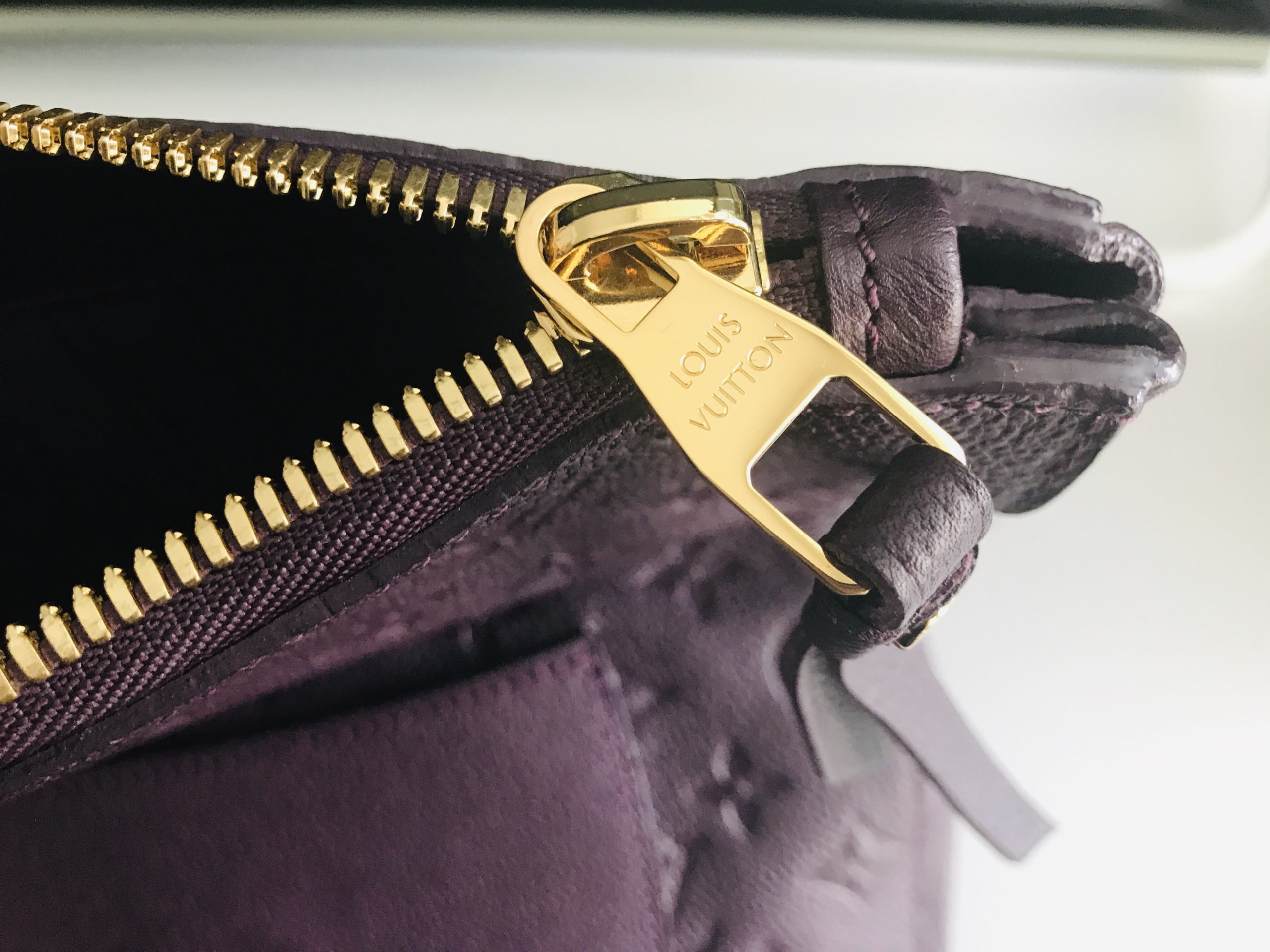 Louis Vuitton Aurore Monogram Empreinte Leather Petillante Clutch
