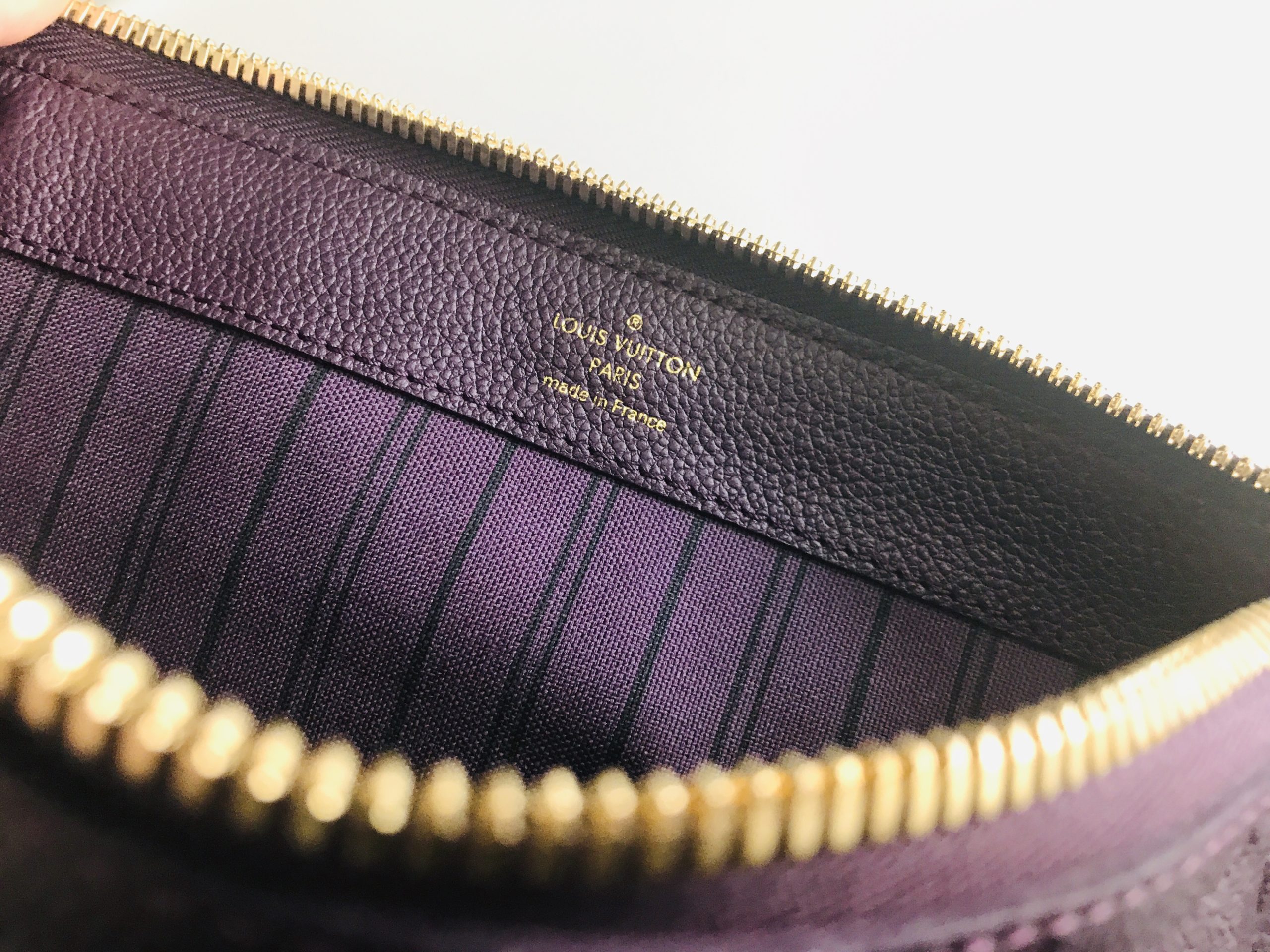 Leather clutch bag Louis Vuitton Purple in Leather - 29202094