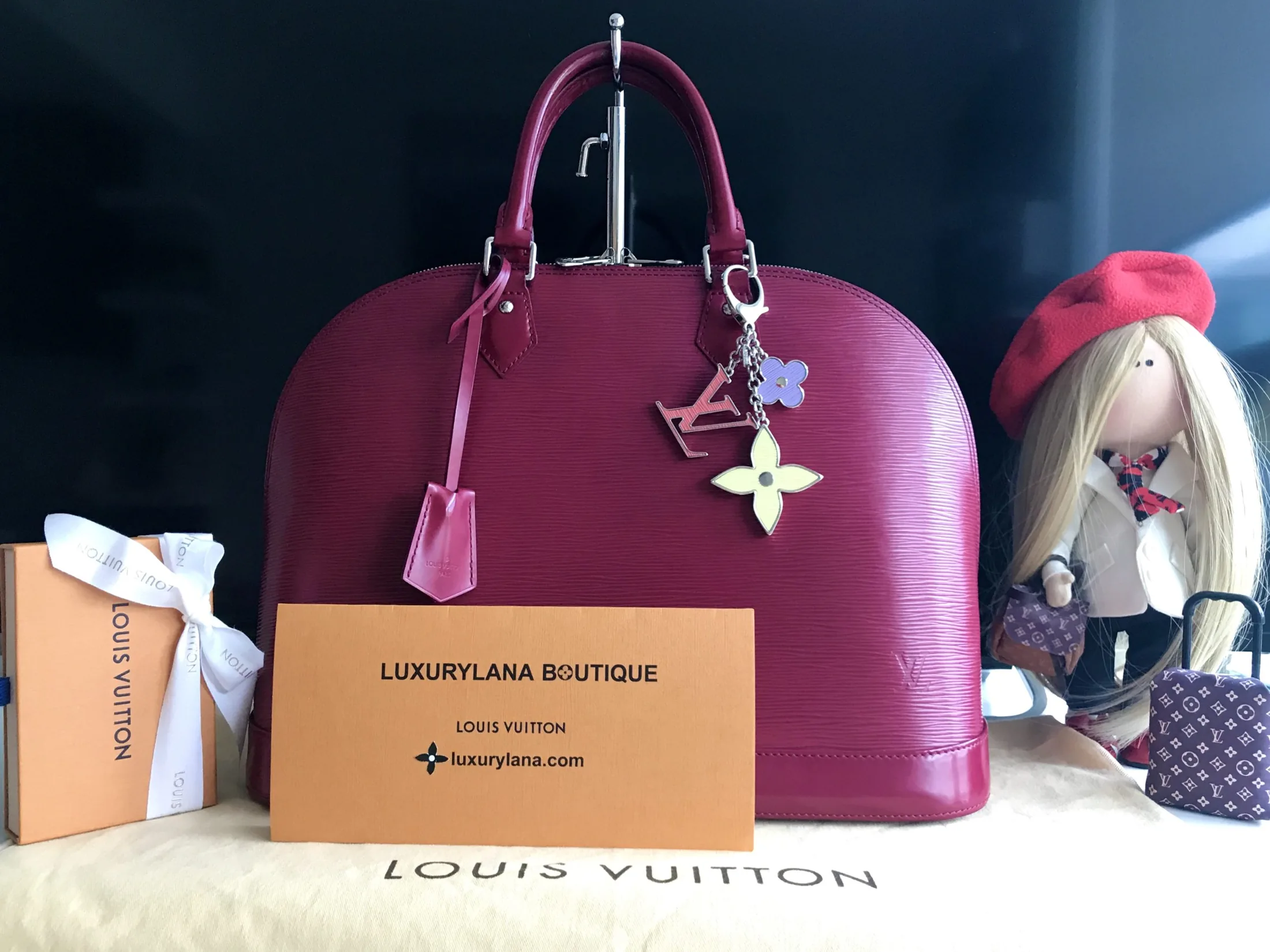 Alma GM Fuchsia Epi Leather Handbag