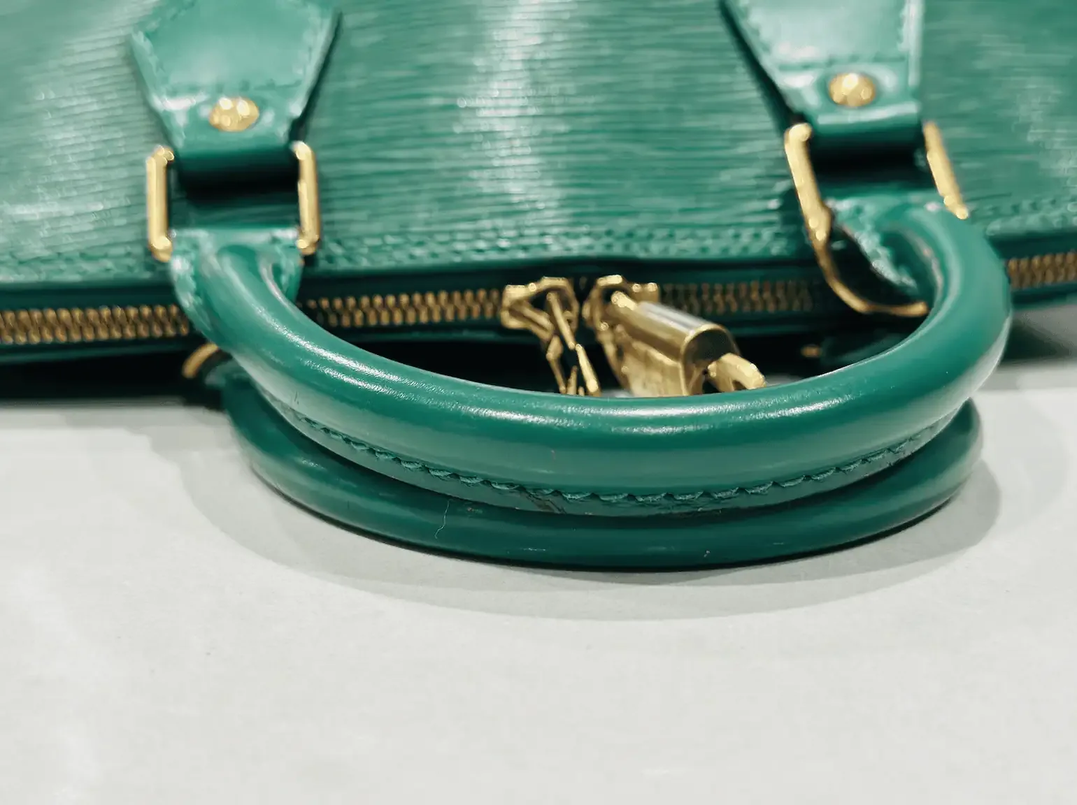 Green Epi Leather Alma Handbag — image 7