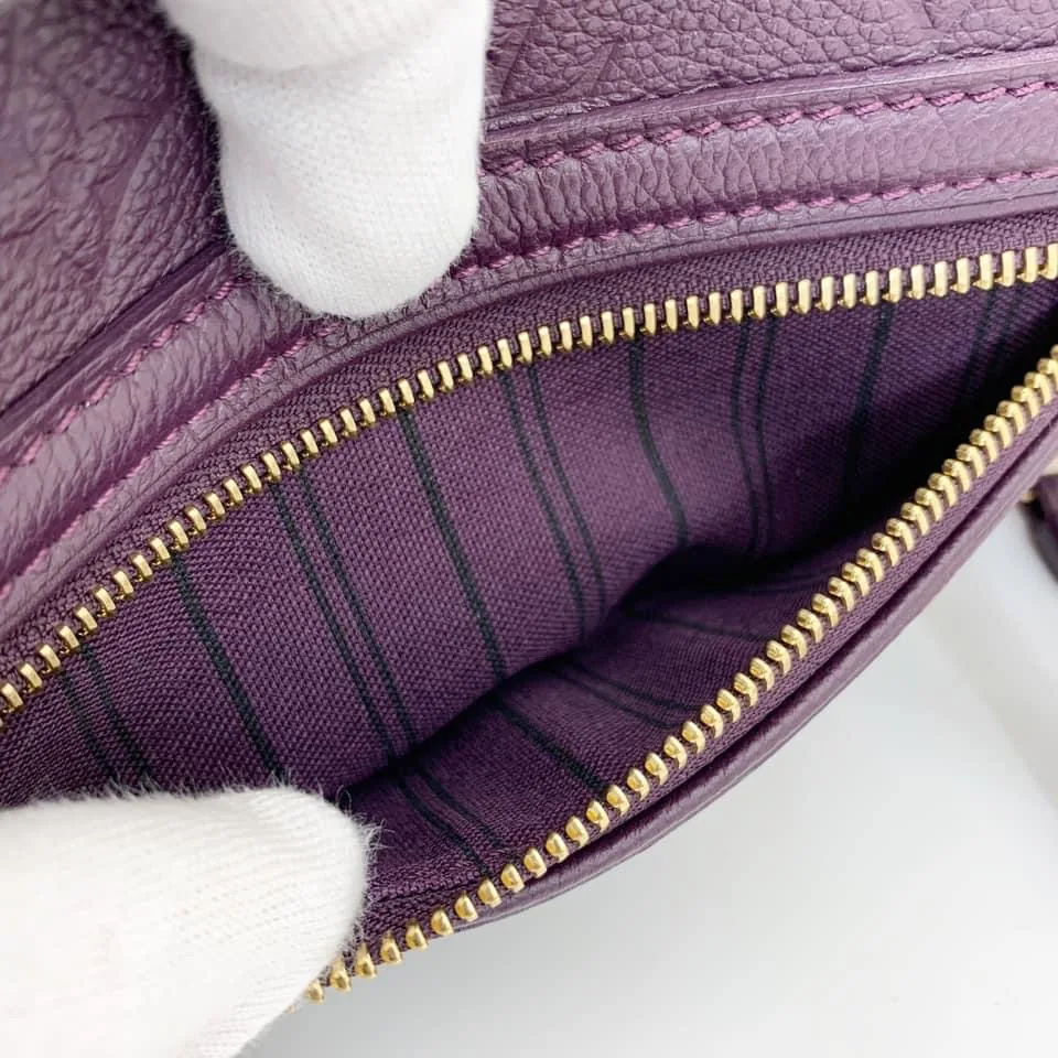 Petillante Aurore Monogram Empreinte Leather Clutch — image 2