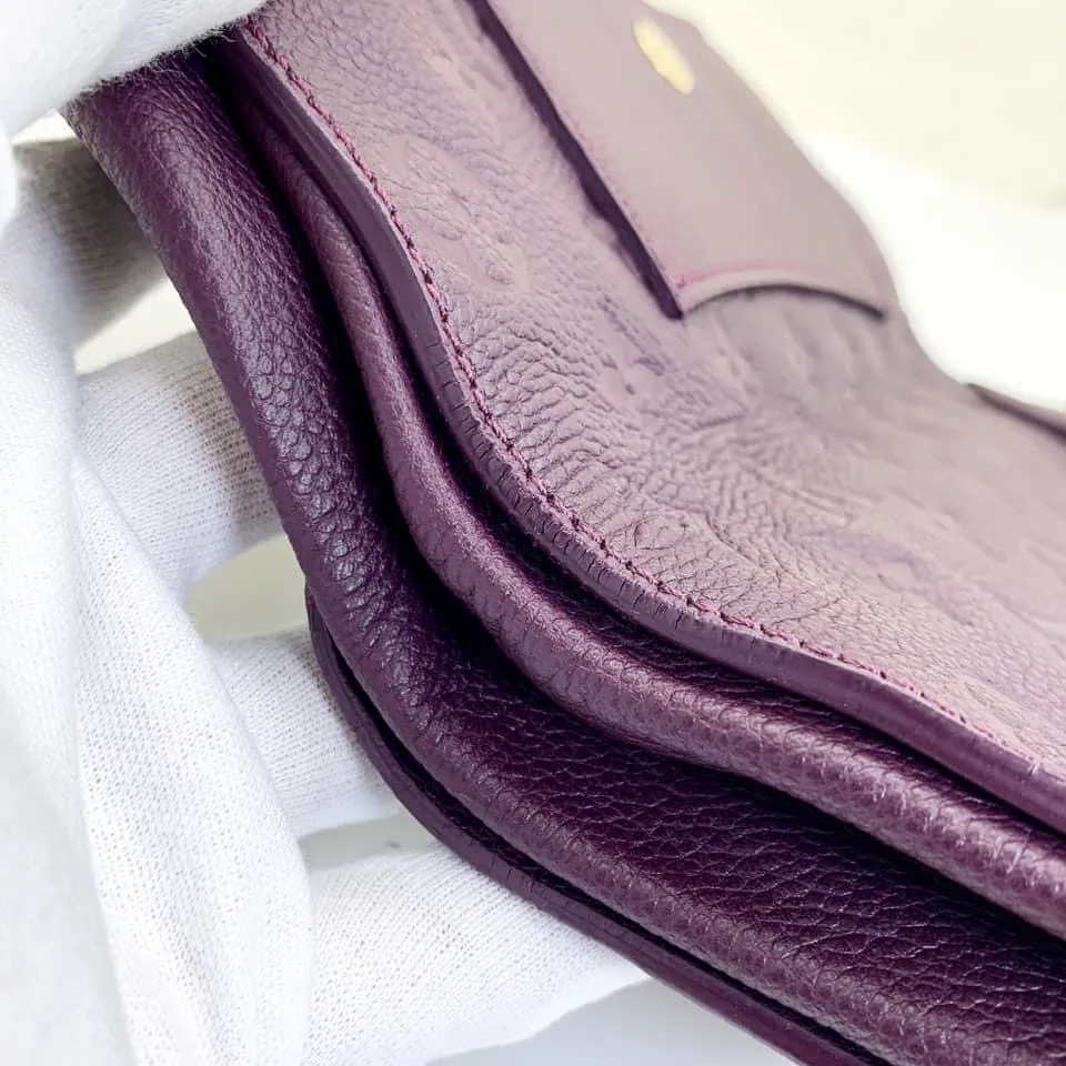 Petillante Aurore Monogram Empreinte Leather Clutch — image 3