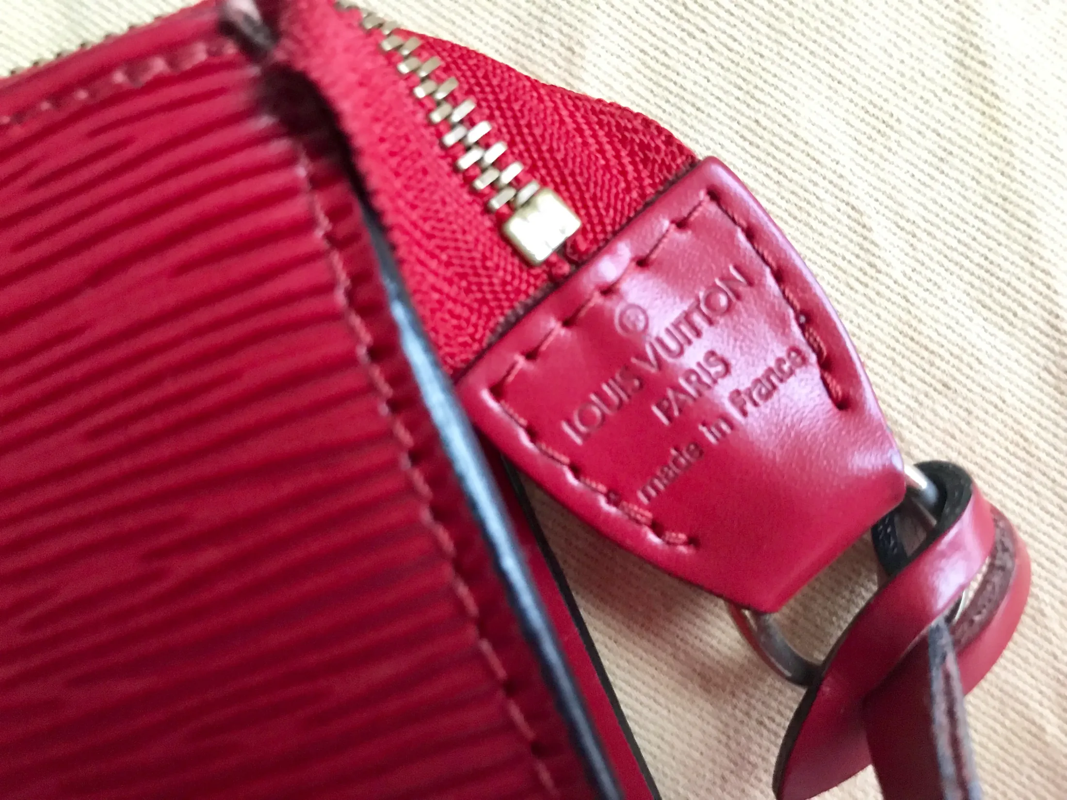 Red Epi Leather Pochette Handbag — image 6