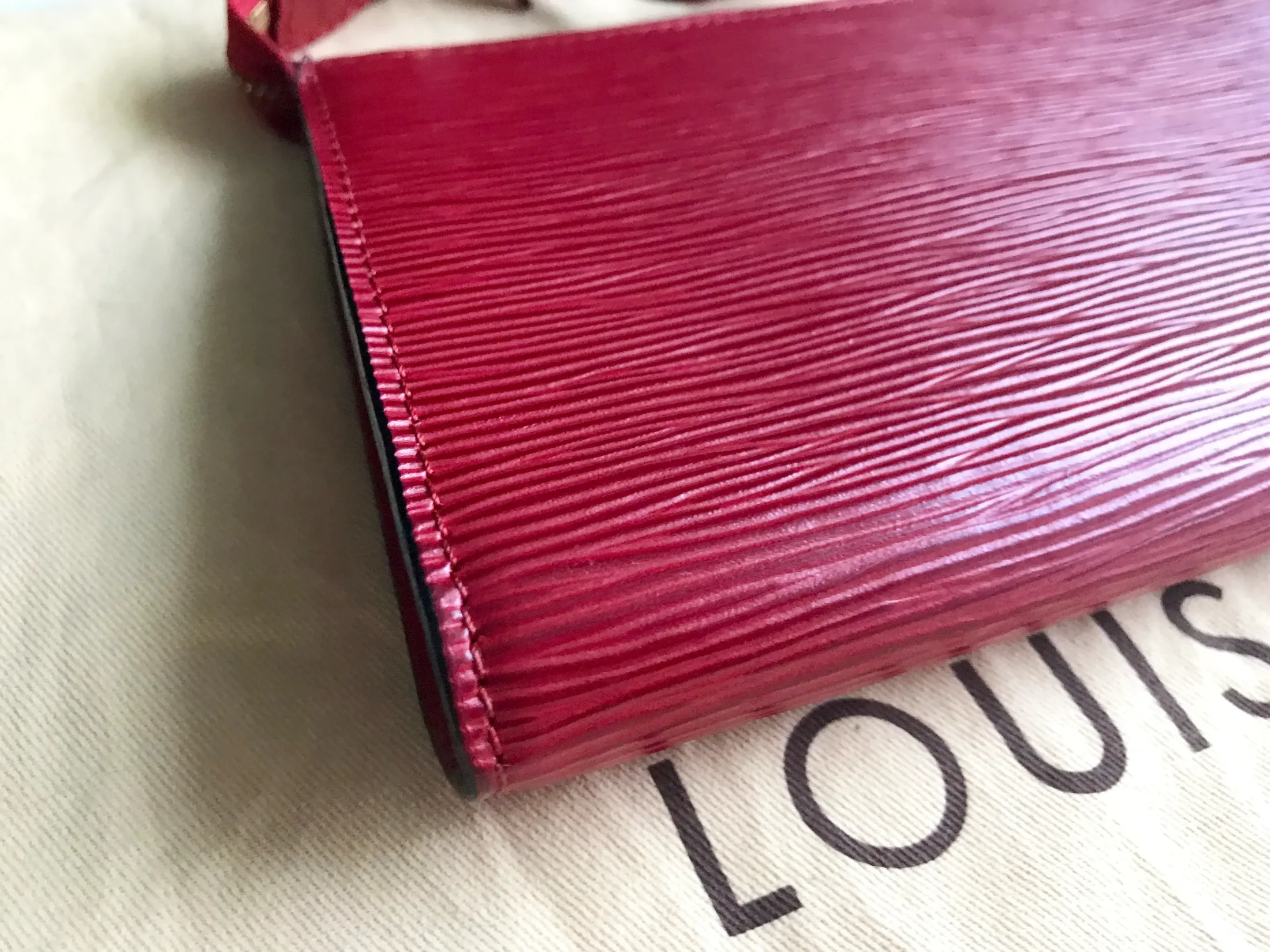 Red Epi Leather Pochette Handbag — image 10
