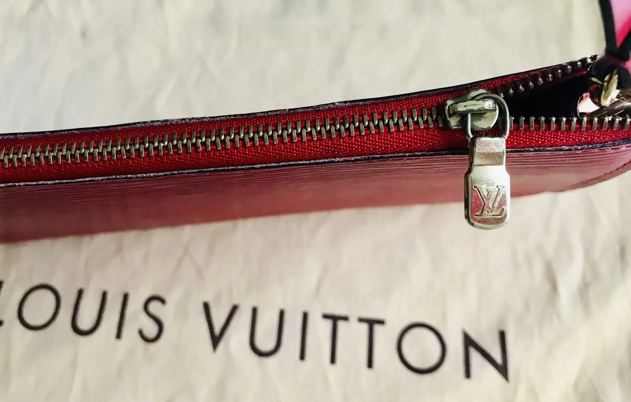 Red Epi Leather Pochette Handbag — image 12