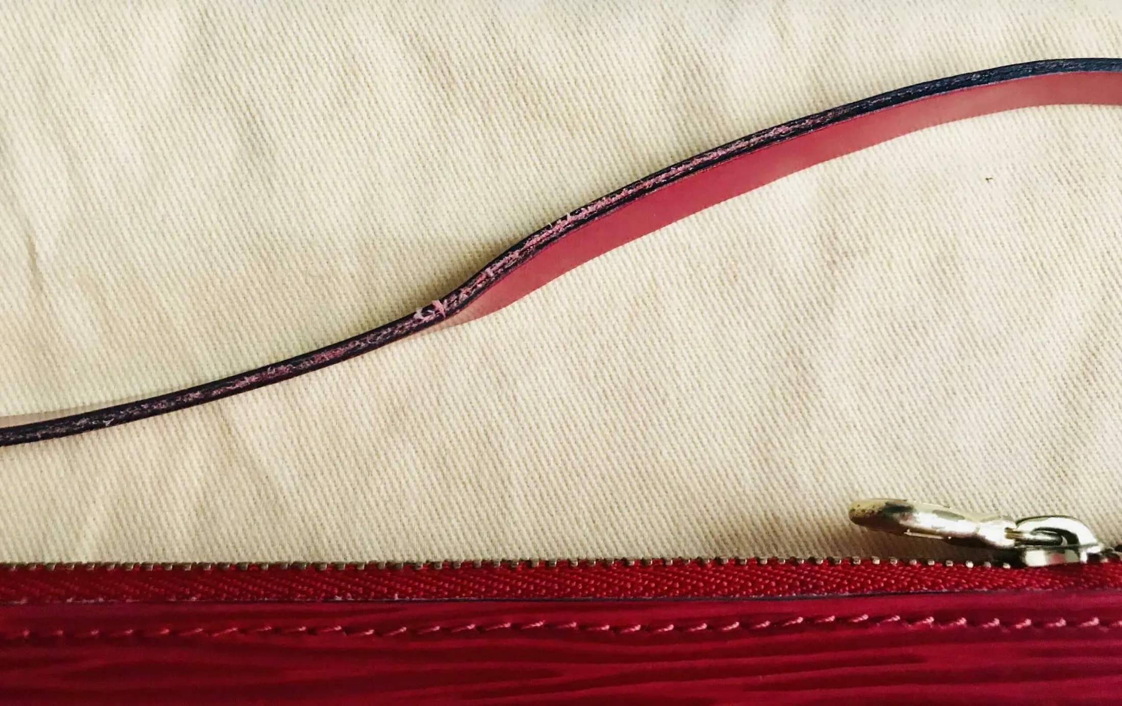 Red Epi Leather Pochette Handbag — image 13