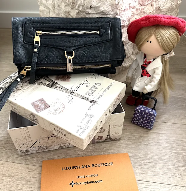 Monogram Petillante Empreinte Leather Clutch — image 2