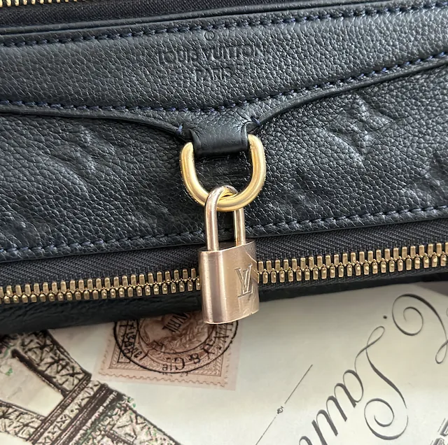 Monogram Petillante Empreinte Leather Clutch — image 4