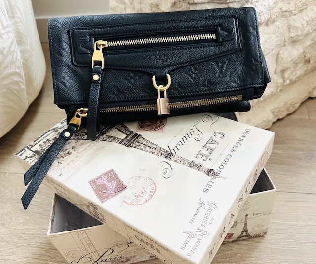 Monogram Petillante Empreinte Leather Clutch — image 5