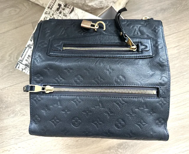 Monogram Petillante Empreinte Leather Clutch — image 10